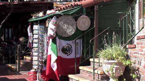 shop with mexican flag in pueblo, downtown los angeles, california, usa