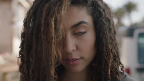 portrait of beautiful hispanic woman looking pensive mysterious