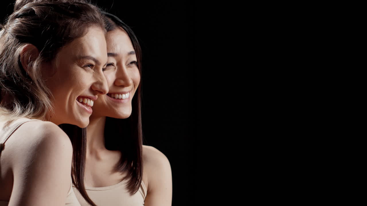 Two Beautiful Women Smiling