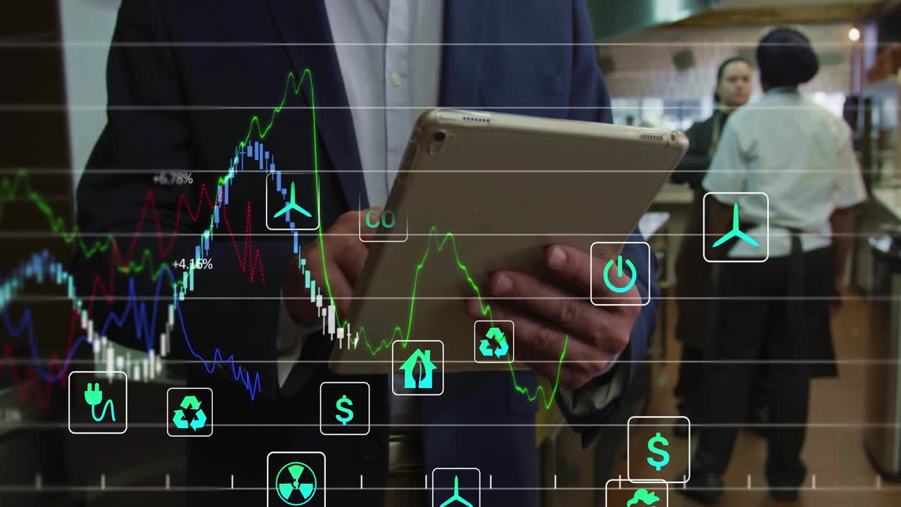 Administrador mirando una tablet en la que se muestran gráficos de energía y finanzas en la cocina, revisando datos en el sofá