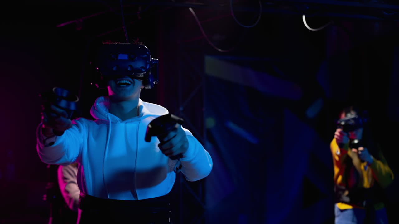 Teenagers playing with a Virtual Reality headset in a studio