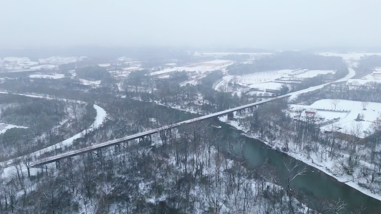 Aerial shot of the snow covered Chattahoochee River and National Park in Atlanta, Georgia on January 10th 2025.