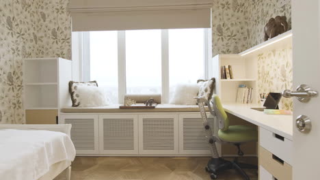 cozy and functional kids' study room with built-in desk and window seat