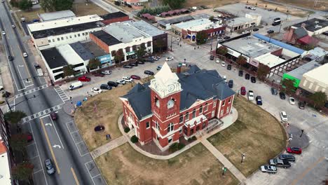 The-town-of-Jackson-in-the-State-of-GA-used-for-stranger-things-as-"Downtown-Hawkins"-Part-2---Buildings-and-transit-driving-by-and-parked-During-morning-time