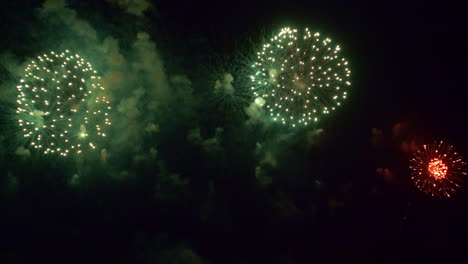 Beautiful-abstract-colourful-Fireworks-explode-display-on-sky-at-night-a-symbol-of-celebration-in-New-years-anniversary-for-background