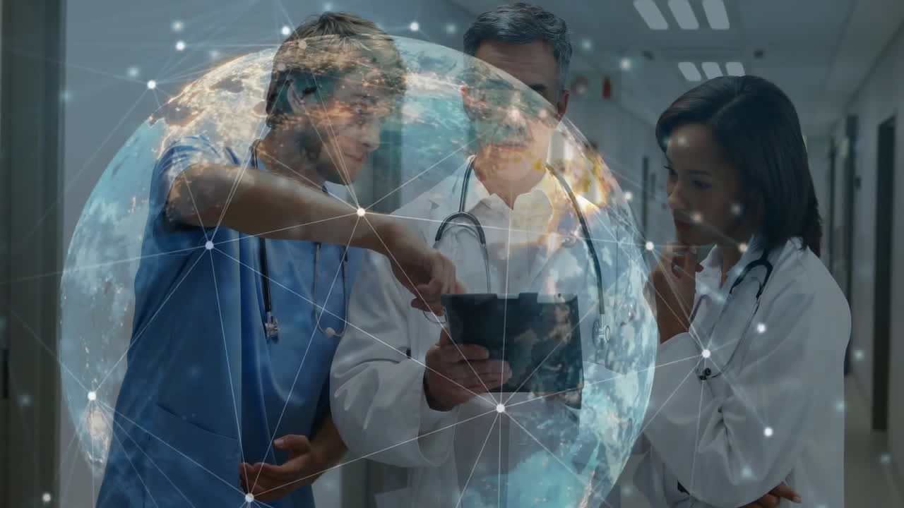 Medical team gathering around tablet in hospital corridor, displaying holographic network lines