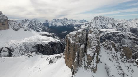 aerial footage of the "tre cime di lavaredo" in winter