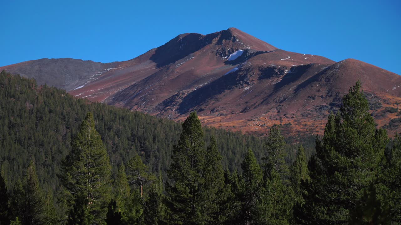 Tioga Pass Mt Dana view Yosemite National Park West Portal entrance wilderness forest rugged rocky formation terrain California Lee Vining forest sunny blue sky Sierra Nevada Mountain nature slide