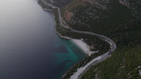 Secluded-white-beach-Veliki-žal-on-Adriatic-sea-coastline-during-Sunset