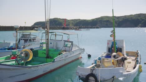 small japanese harbor in on bright sunny day in osatsu town, mie prefecture