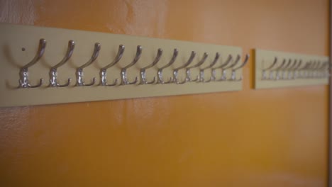 Empty-hangers-in-an-abandoned-school-hallway-during-covid-quarantine