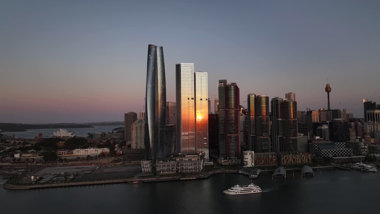 Darling Harbour Waterfront And Barangaroo At Dusk In Sydney, Australia - Aerial Pullback