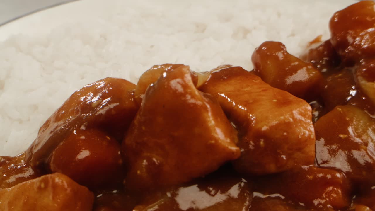 Japanese curry rice with fry pork Tonkatsu, Katsu Kare, Japanese breaded cooking dinner in restaurant, close up macro of asian food