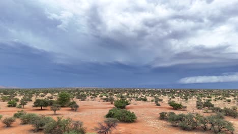 aerial panning shot of storm clouds building in the southern kalahari