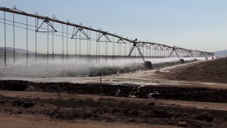 pan shot of center pivot irrigation california usa