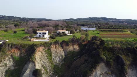 breathtaking aerial view flight panorama overview drone footage of a
luxury villa at paradise wild nature canyon dream beach marathias malibu corfu greece