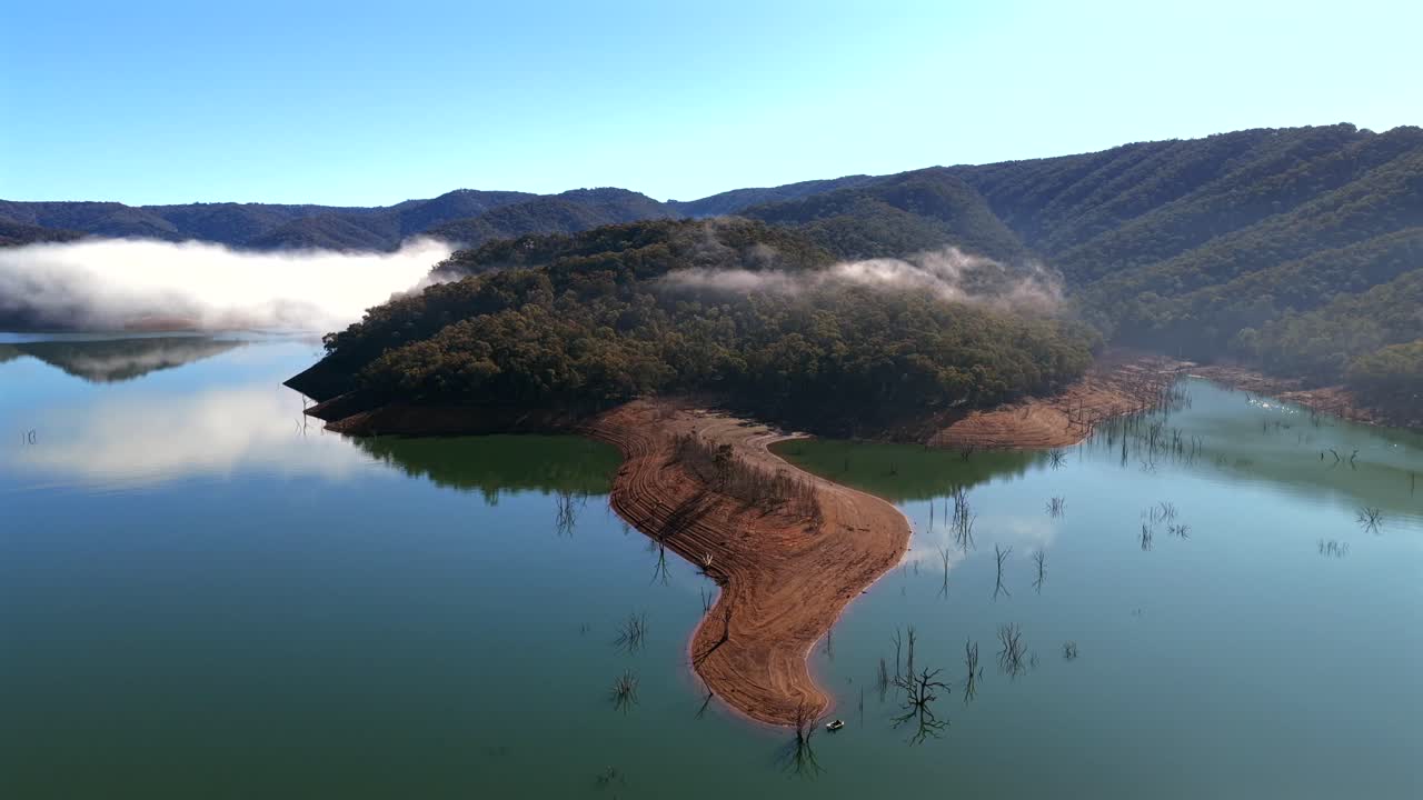 Lake Eildon Drone shot on a blue sky day with mist