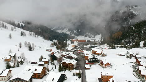 Snow-Covered-Village-With-Snowfall-And-Fog-In-Uzbekistan,-Central-Asia---aerial-drone-shot