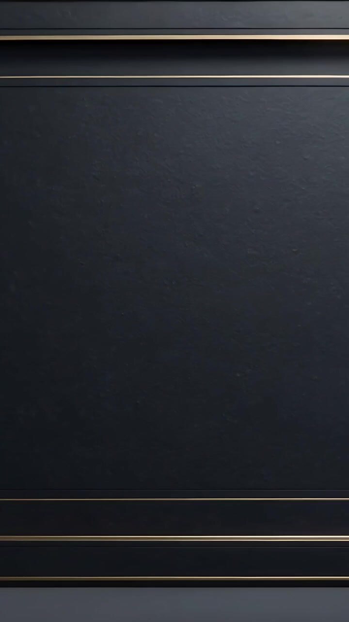 Vertical video: Retracting dark curtain revealing textured wall panel on stage, with gold trim