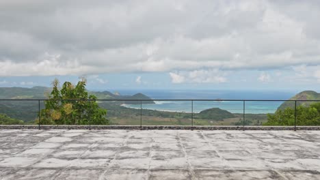 cinematic slider camera going across rooftop with scenic views through the valley below