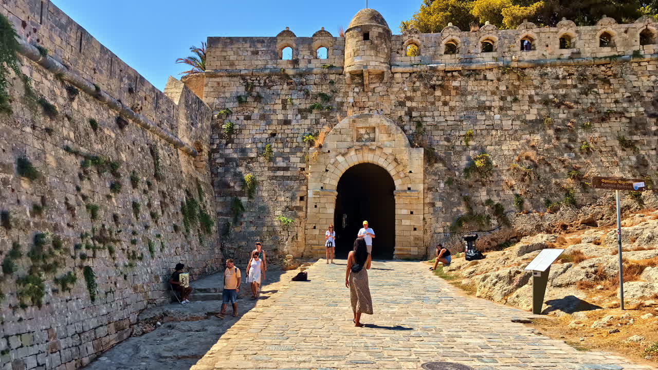 Tourists visit the Venetian Fortezza Castle at the citadel of Rethymno in Crete, Greece