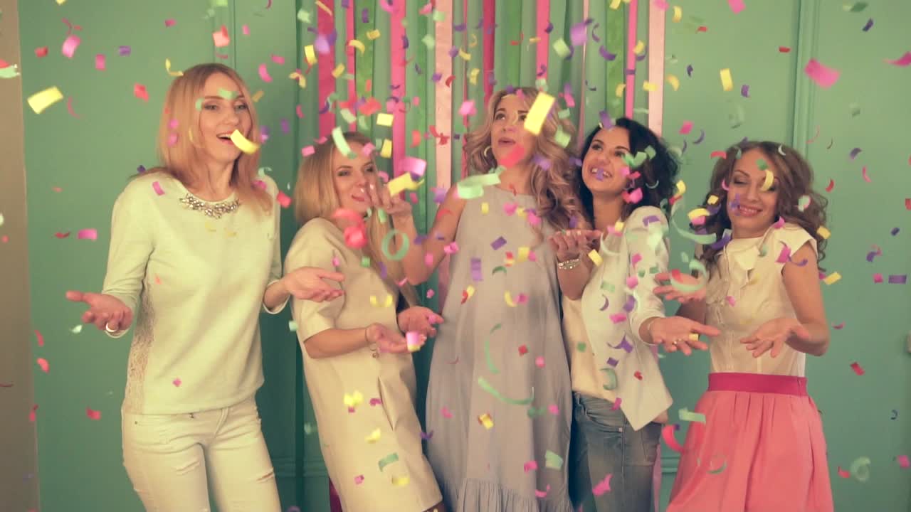 Women Celebrating with Confetti
