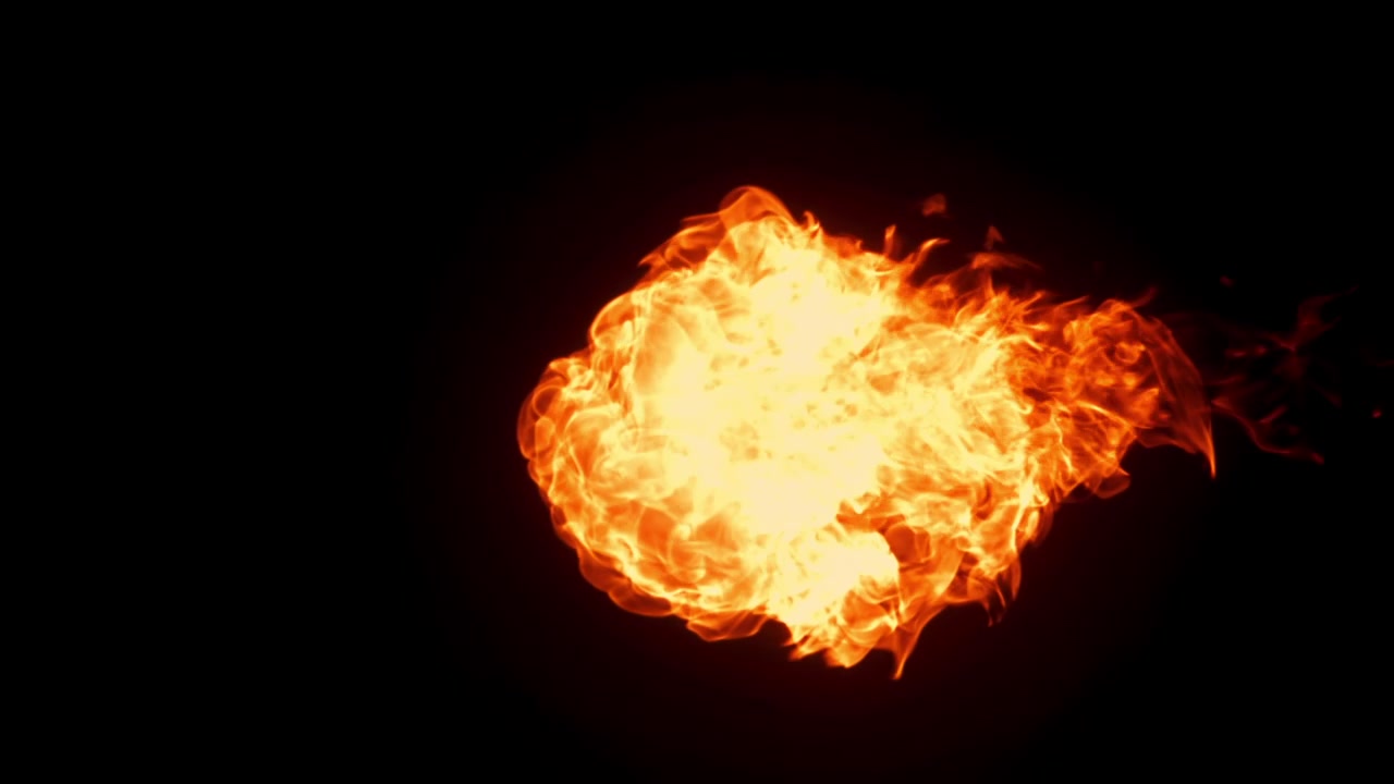 Realistic Fireball Igniting and Fading on Black Background