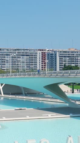 modern bridge and urban park with people