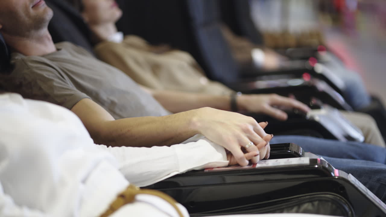 People relaxing in massage chairs