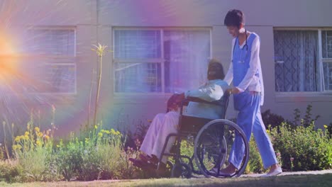 Animation-of-light-moving-over-nurse-wheeling-senior-man-in-wheelchair