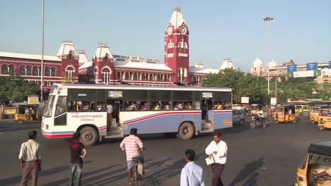 Vehicles-and-pedestrians-pass-through-a-busy-intersection-in-time-lapse