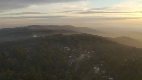 slow aerial drone rise above olinda, victoria, australia township on winter afternoon