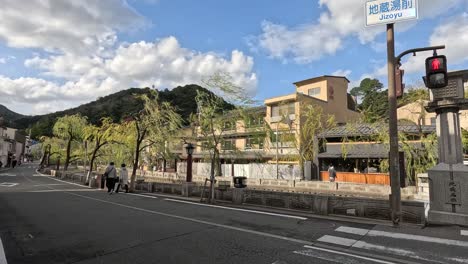 people crossing street at a scenic urban junction