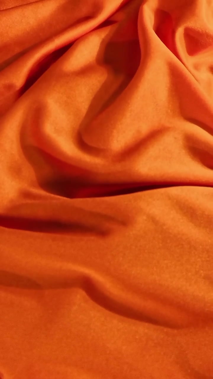 Texture di tessuto arancione, sfondo astratto