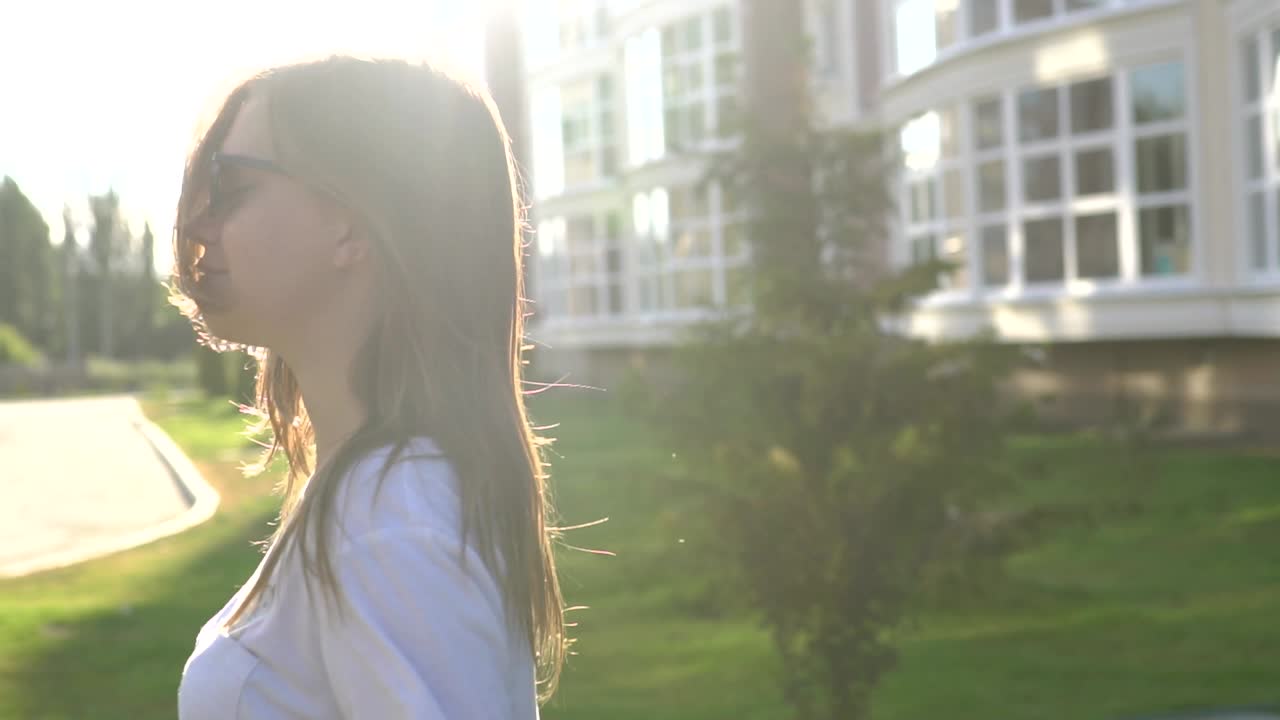 Woman Outdoors in City Park