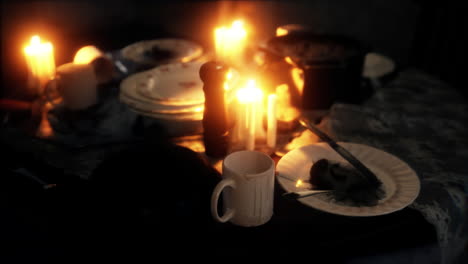 table setting in candlelight at night