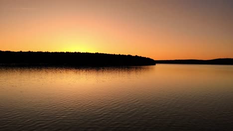 calming early morning sunrise over the water