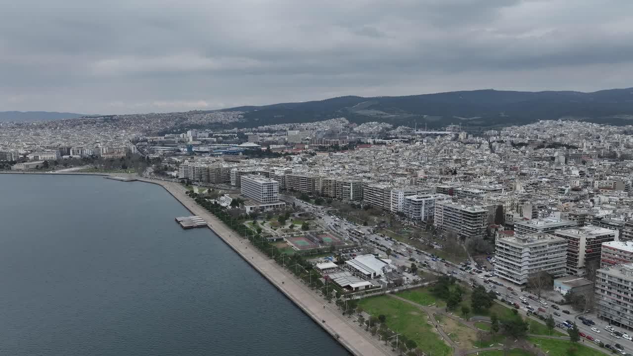 Thessaloniki city along thermaic gulf with buildings and coastline, aerial view