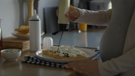 Pregnant-woman-making-unhealthy-snacks.