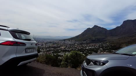 table mountain aerial cableway going up from the road overlooking cape town cbd in south africa