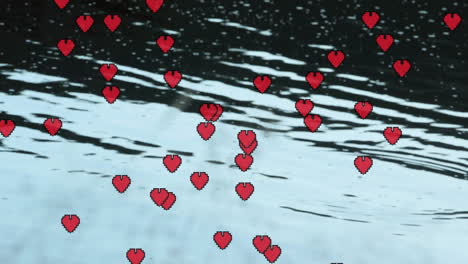 Animating-red-heart-icons-over-snowy-landscape-with-falling-snowflakes