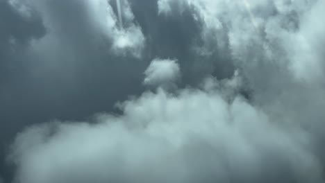 Pilot-POV-real-time-flight-through-a-threatening-stormy-sky