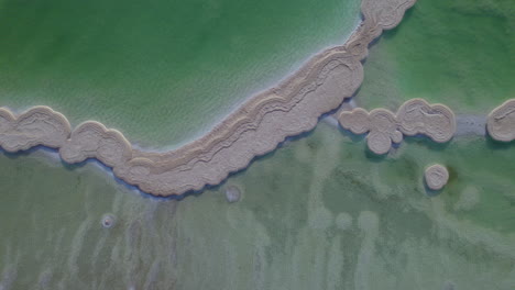 Top-down-view-of-huge-lumps-of-salt-created-by-the-movement-of-water-in-the-Dead-Sea