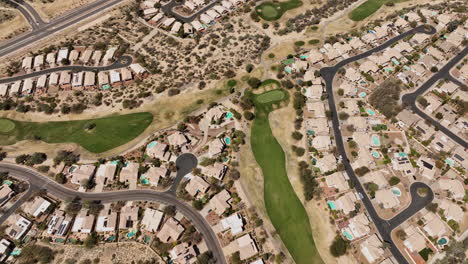 tucson arizona aerial v9 birds eye view drone lowering flyover canada hills neighborhood in oro valley capturing residential homes and golf course from above - shot with mavic 3 cine - march 2022