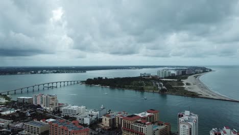 causeway bridge, clearwater, florida, hotels rain clouds aerial, forward pan