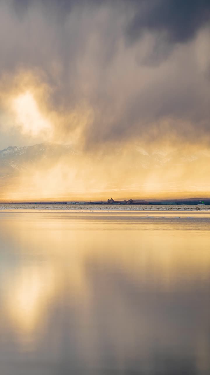 Timelapse of Real Rainy Clouds Moving Above Calm Water at Sunset