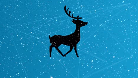 snow falling over silhouette of reindeer walking against network of connections on blue background