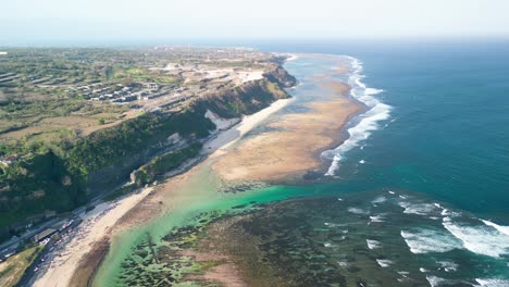 High-altitude-aerial-over-coastline-in-Bali,-Indonesia