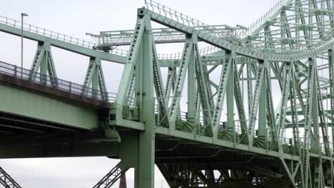 Green-iron-girders-Runcorn-silver-Jubilee-bridge-traffic-crossing