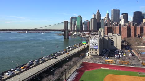 the brooklyn bridge east river and fdr parkway on a clear sunny day in new york city 2